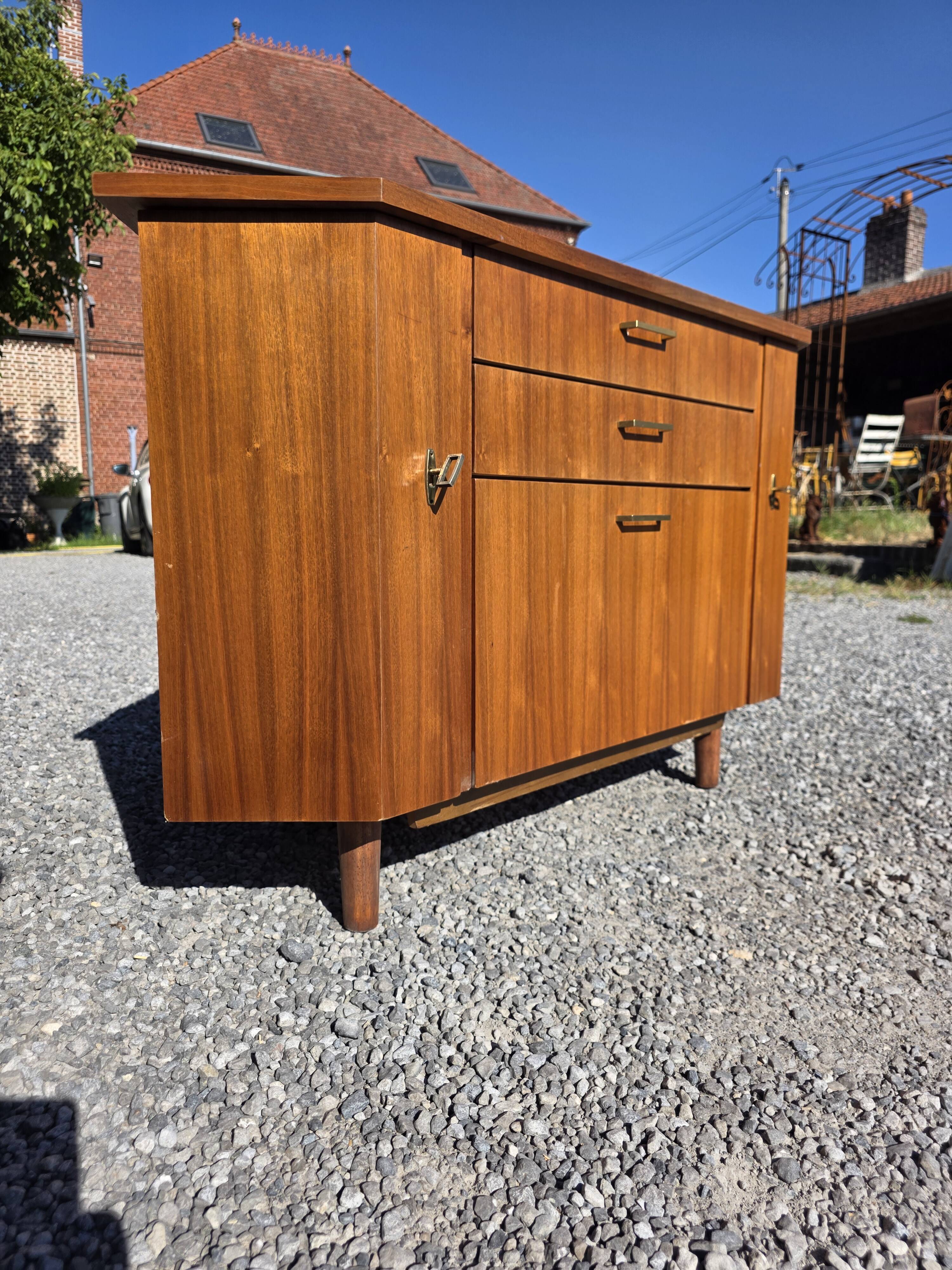 Scandinavian corner unit in teak from the 1960s.