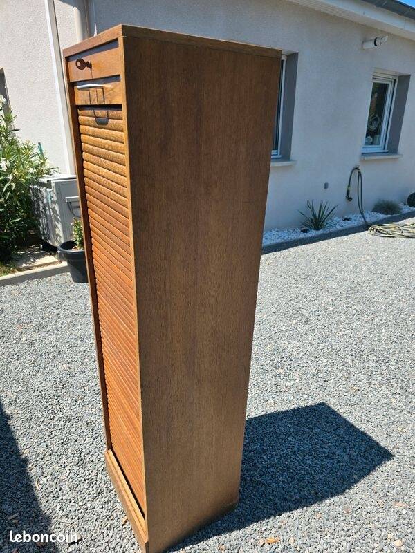 Wooden filing cabinet from the 1970s.