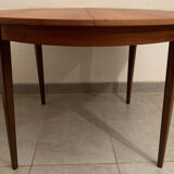 Scandinavian round teak dining table from the 60s extendable