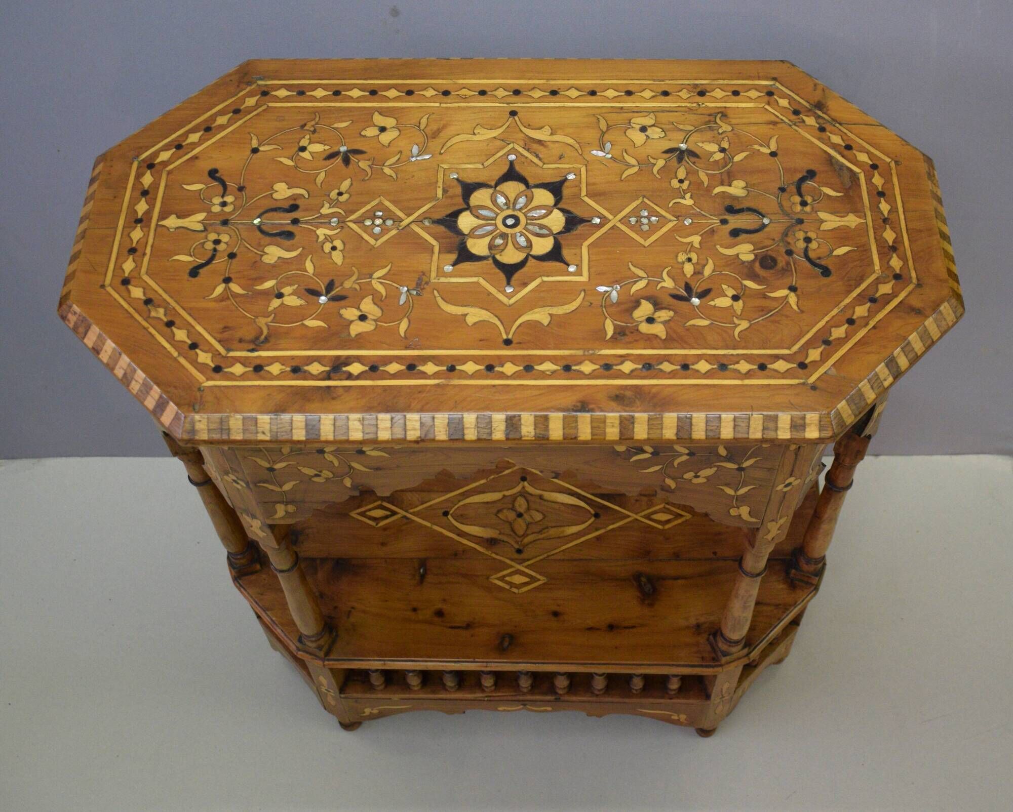 Oriental pedestal table in hexagonal shape made of cedar wood and marquetry