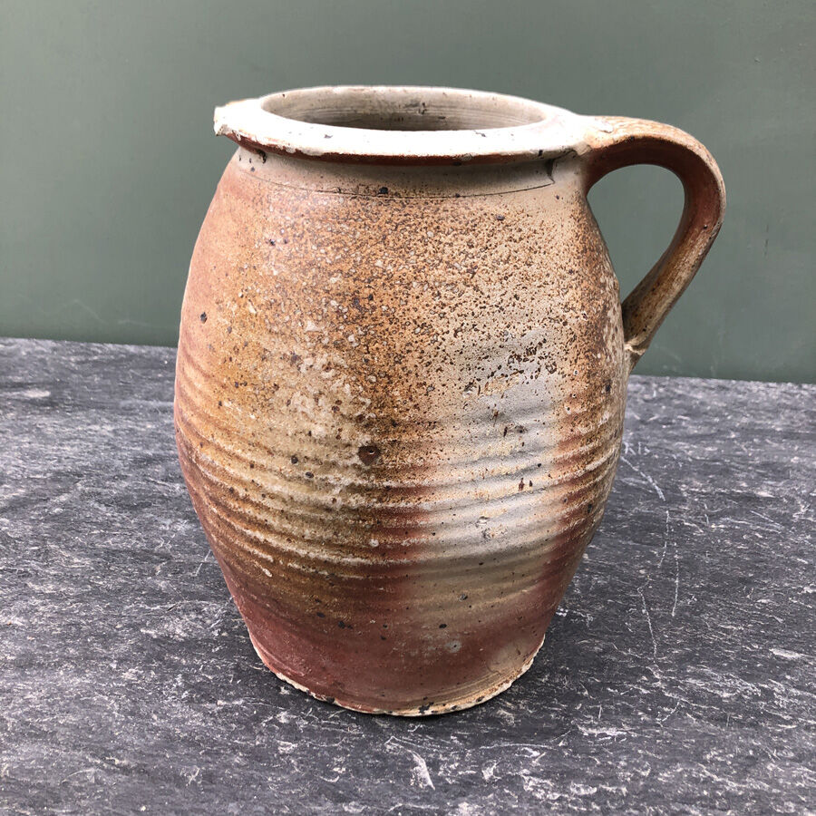 Old pot in glazed sandstone