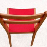 Vintage chairs from the 1950s in wood and faux leather.