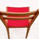 Vintage chairs from the 1950s in wood and faux leather.