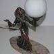 Art deco lamp in regul and marble "woman holding a globe"