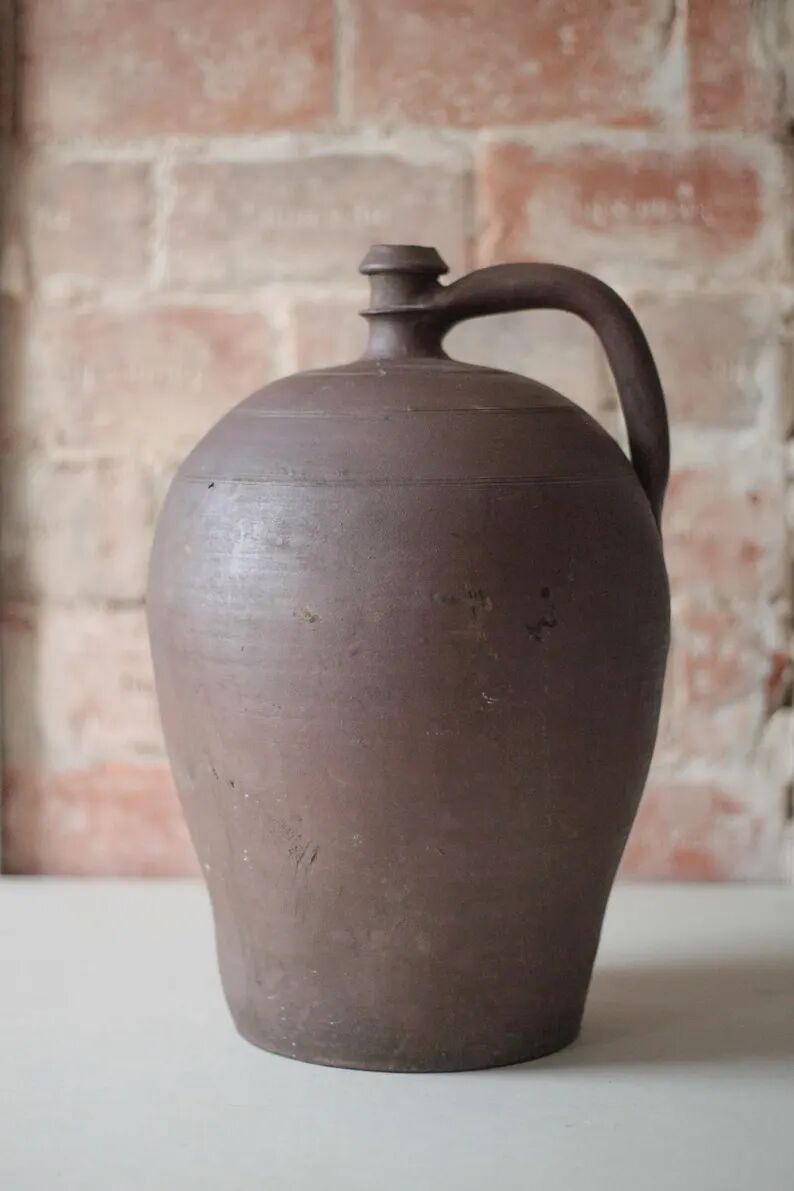 Old handled pot, antique pot, handled jar, interior decoration, collection, pottery.