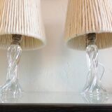 Pair of twisted glass foot bedside lamps and wool/vintage 60s and 70s lampshades