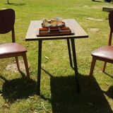 Paire de chaises type Baumann skaï 1960 pieds compas