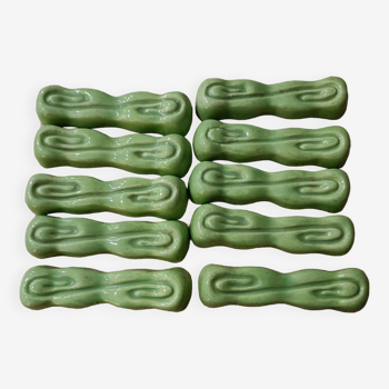 Dix portes couteaux verts céramique