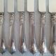 12 knives with silver-plated handles