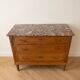 Antique wooden commode with marble and brass.