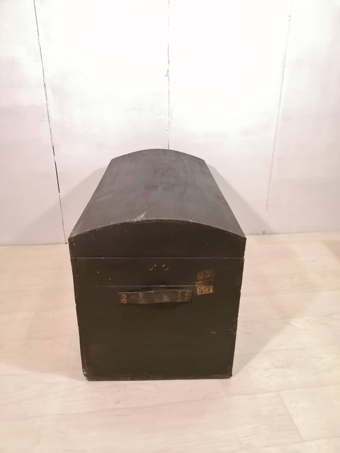 Large travel trunk in blackened wood