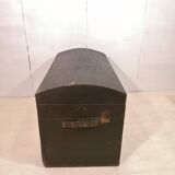 Large travel trunk in blackened wood