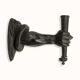 Wall lamp in iron shaped like an arm.