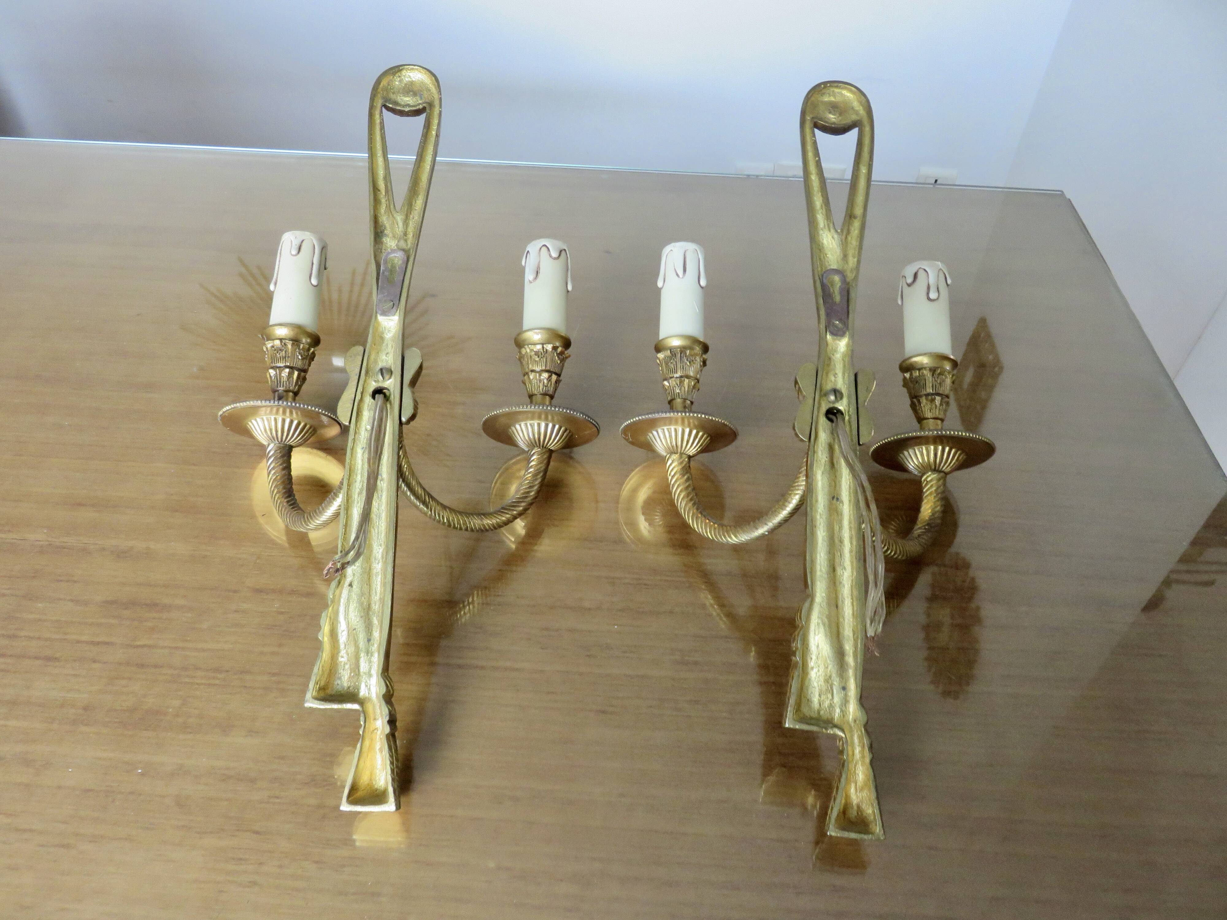 Pair of bronze wall lights, knots and tassels, Peris Andreu edition, 1970