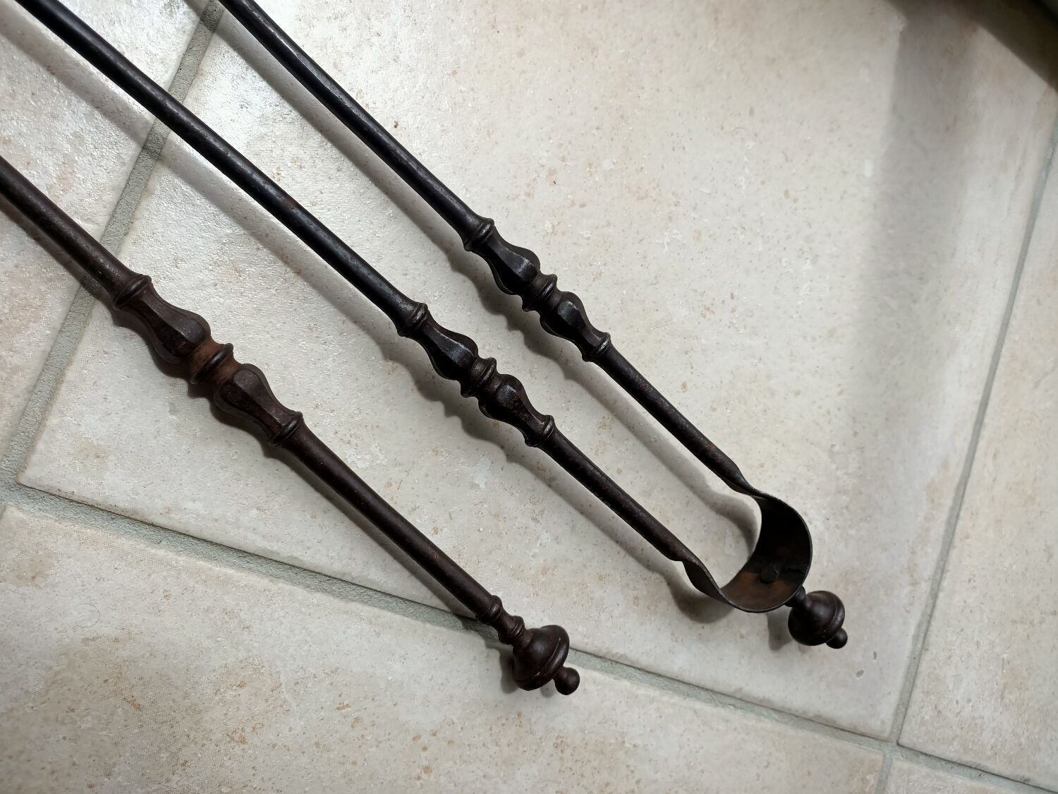 Tisonnier en fer forgé début XIXe