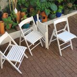 4 folding chairs made of 70's wood