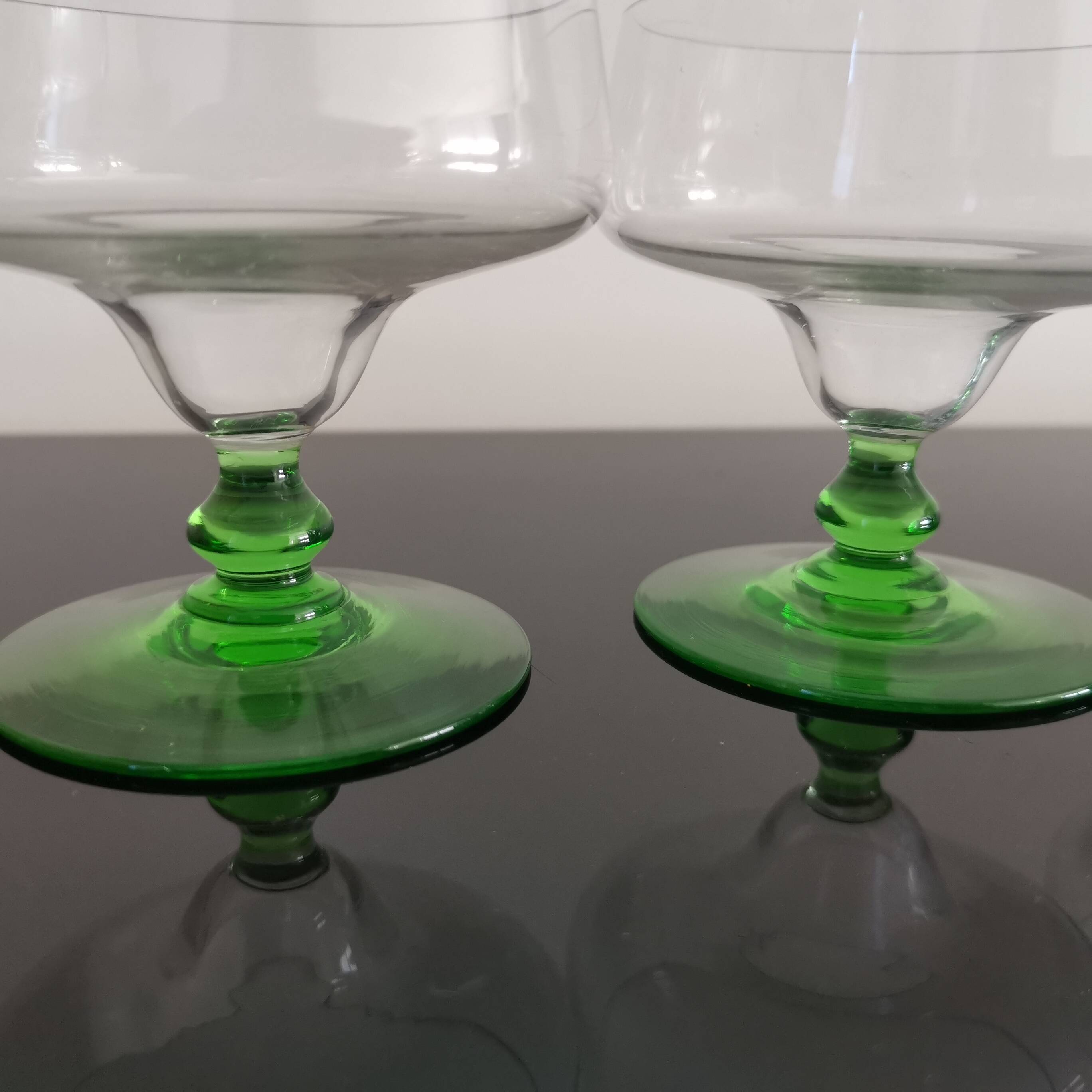Set of 4 champagne glasses on green legs, 1960s