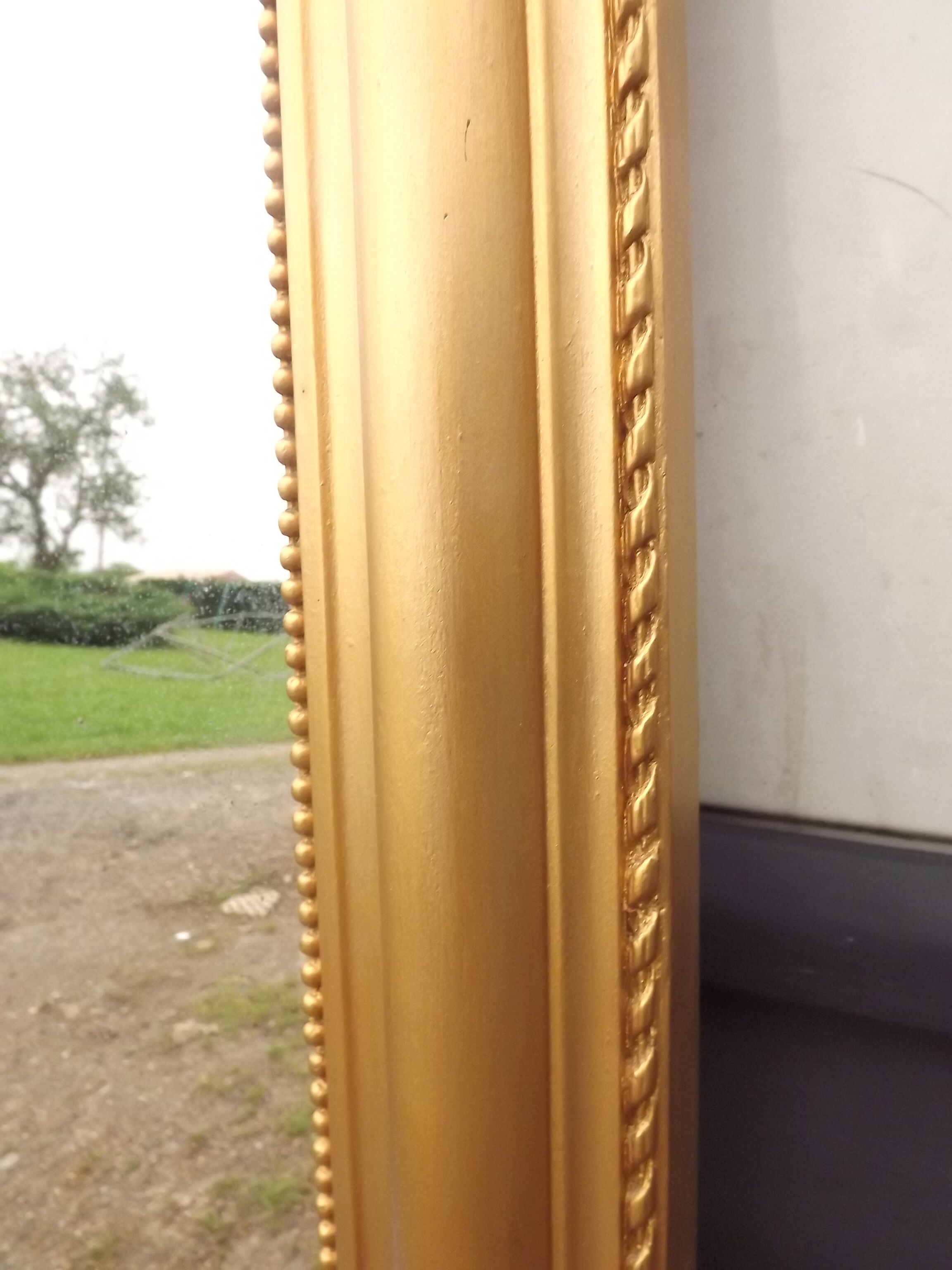 Golden mirror XlXth wood and stuk