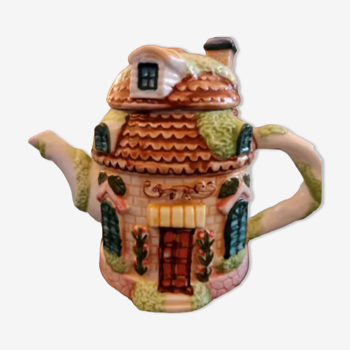 Cottage shaped teapot in vintage porcelain