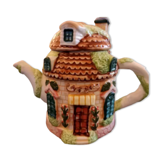 Cottage shaped teapot in vintage porcelain