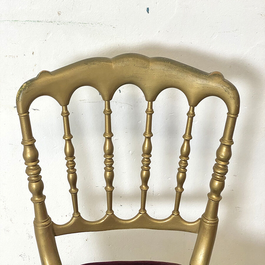 Pair of Charivari chairs in gilded wood