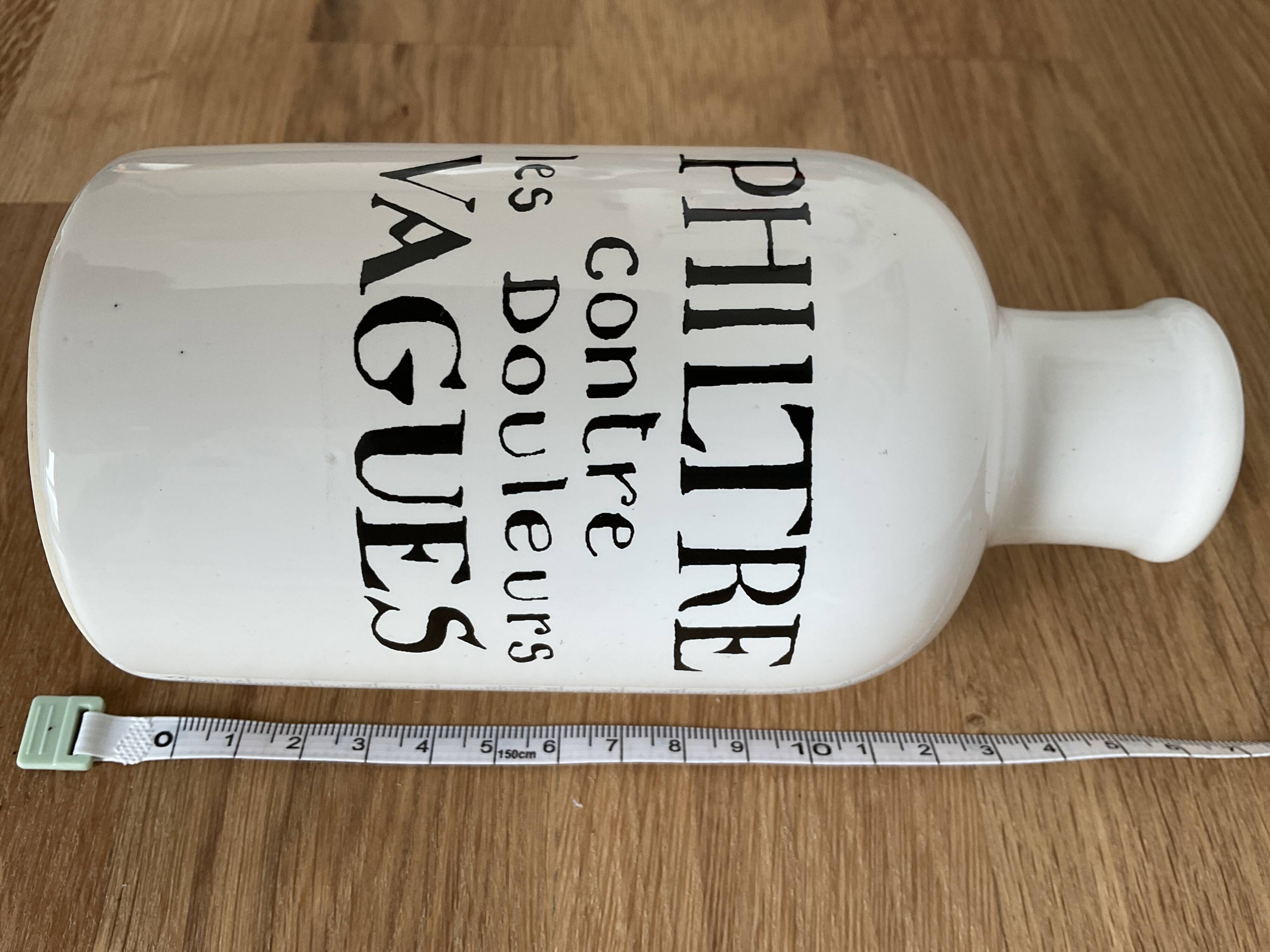 Biot porcelain bottle “philter against vague pain”