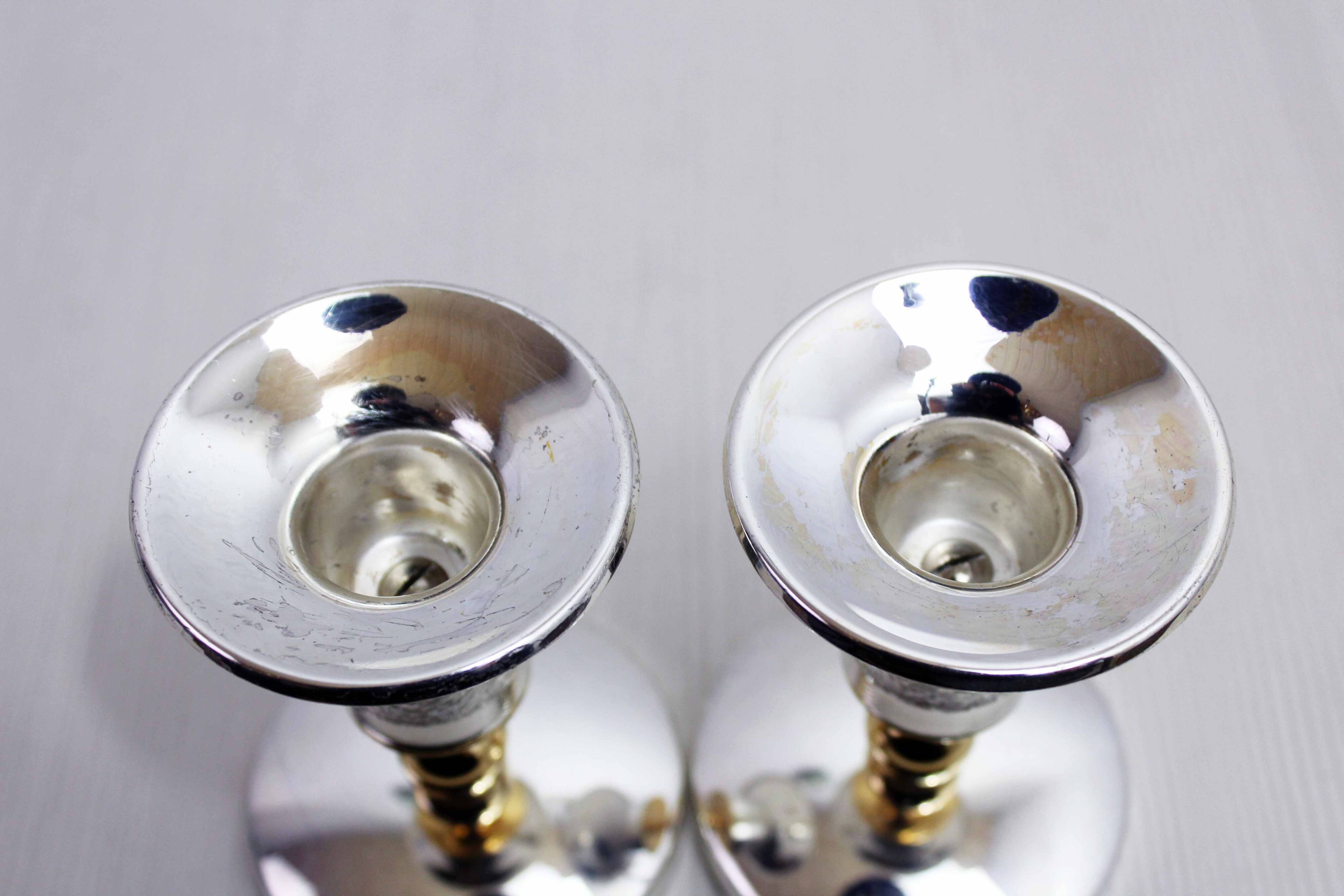 Pair of silver metal candlesticks