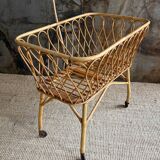 Rattan cradle with arrow