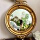 Antique gilded mirror decorated with an eagle