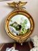 Antique gilded mirror decorated with an eagle