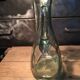 Bluish green glass decanter
