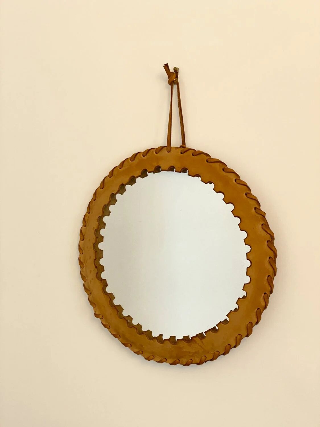Round leather saddle mirror