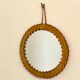 Round leather saddle mirror