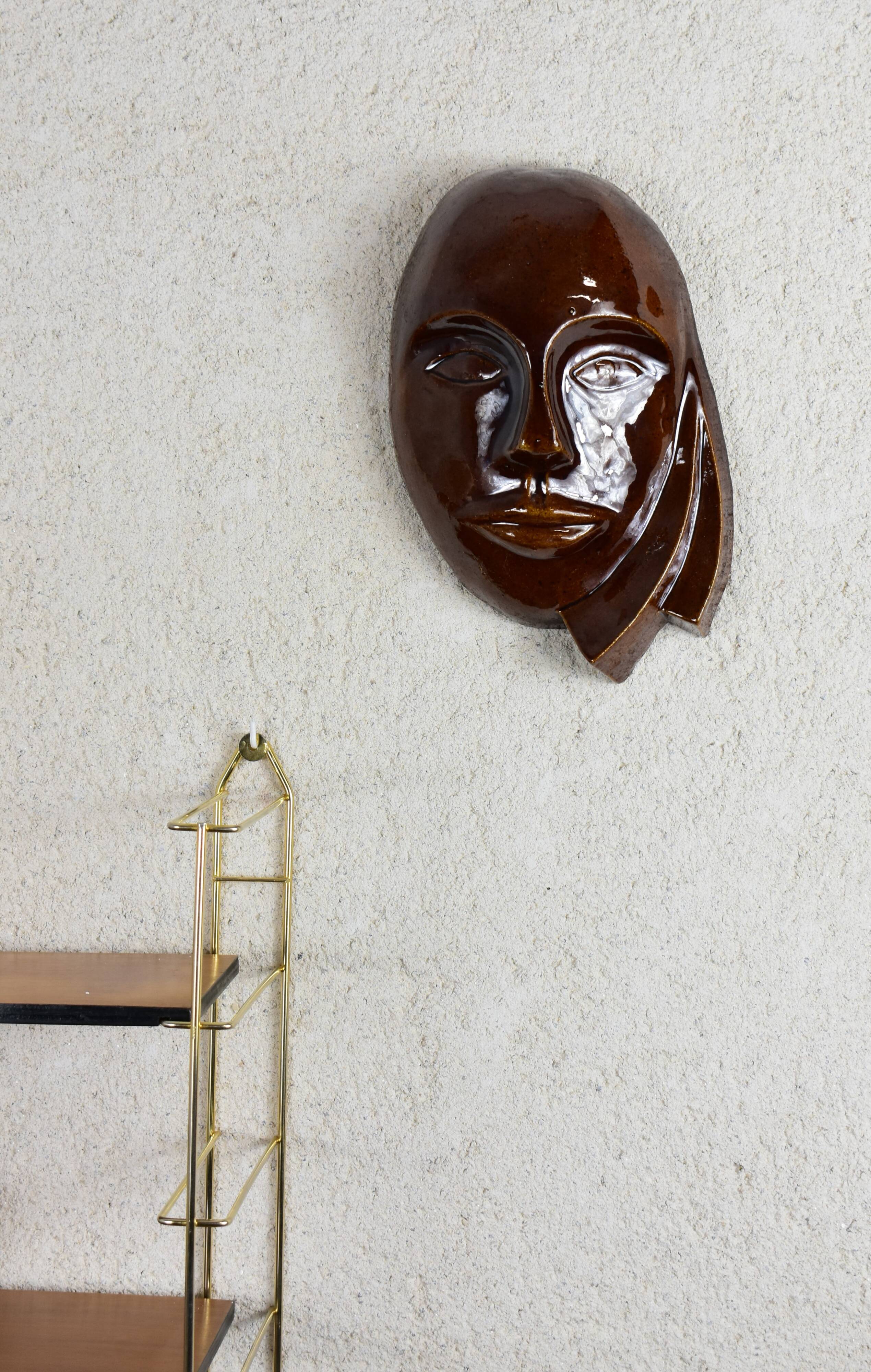 Signed brown enamel mask