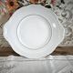 Porcelain mignardise dish with ear handles, double gold line manufacture.
