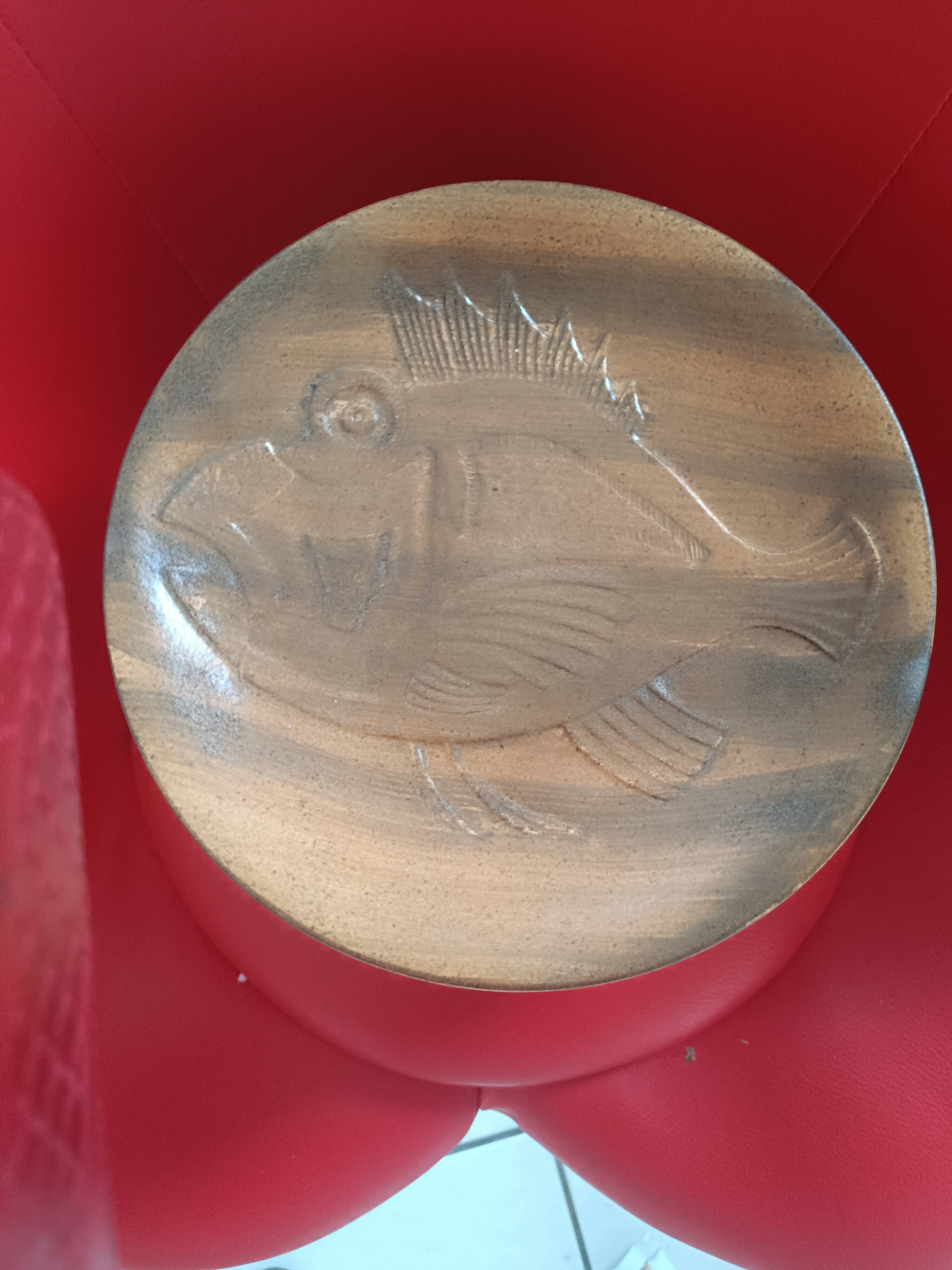 12 stoneware dinner plates in shades of beige and brown. Chantilly, France. Fish motif.