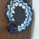 Large vintage shell-shaped blue glazed ceramic bowl