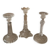 Lot d’anciens bougeoirs en verre