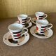 4 cups and saucers, San Marco coffee, Linda Pozzoli decor