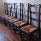 6 wooden and straw chairs