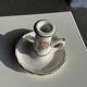 Small vintage hand-held candlestick in earthenware with green trim and floral decoration H10.5