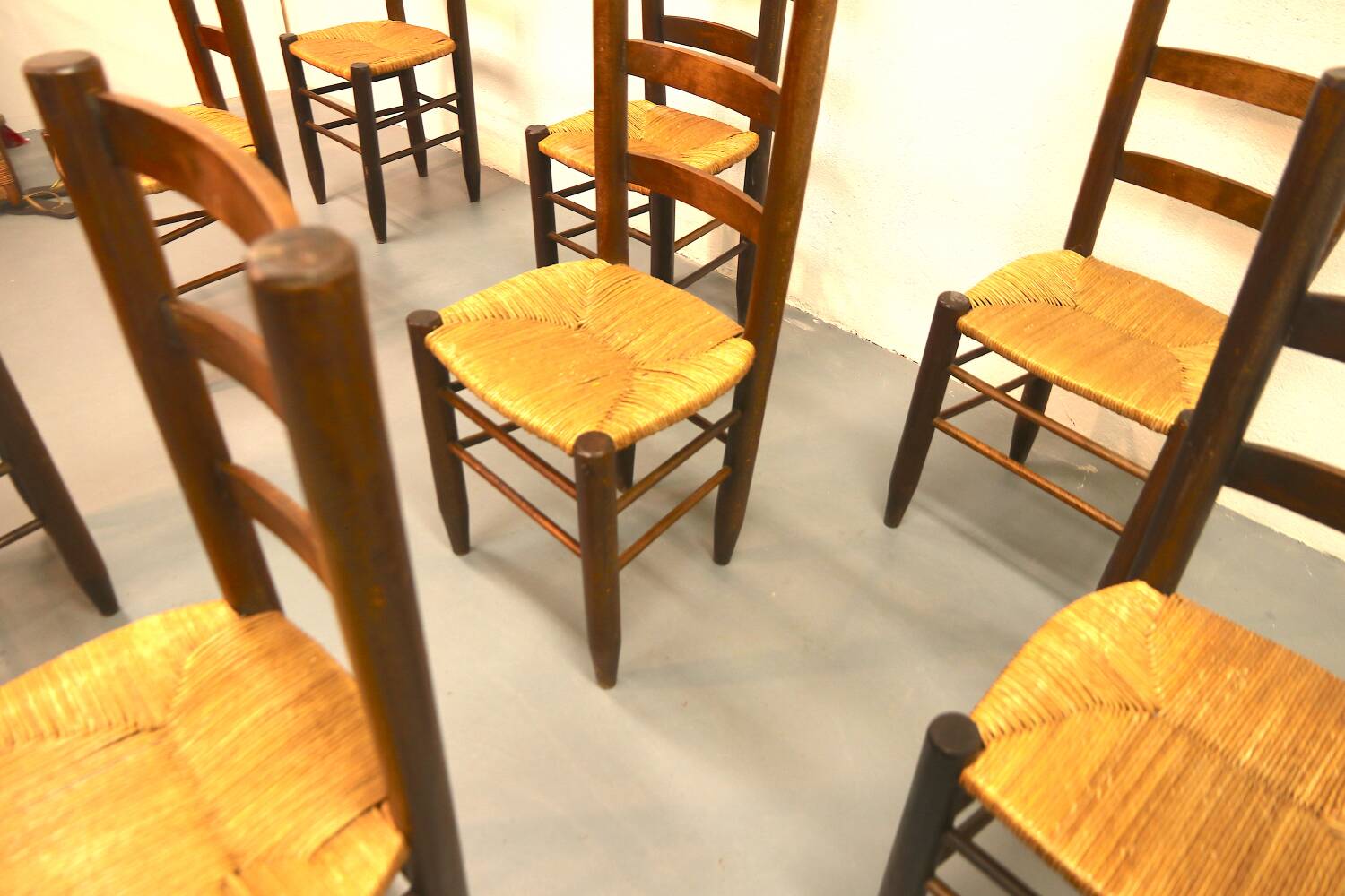 Set of 8 Charlotte Perriand dining chairs Bauche no.19