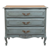Commode de style Louis XV avec une patine