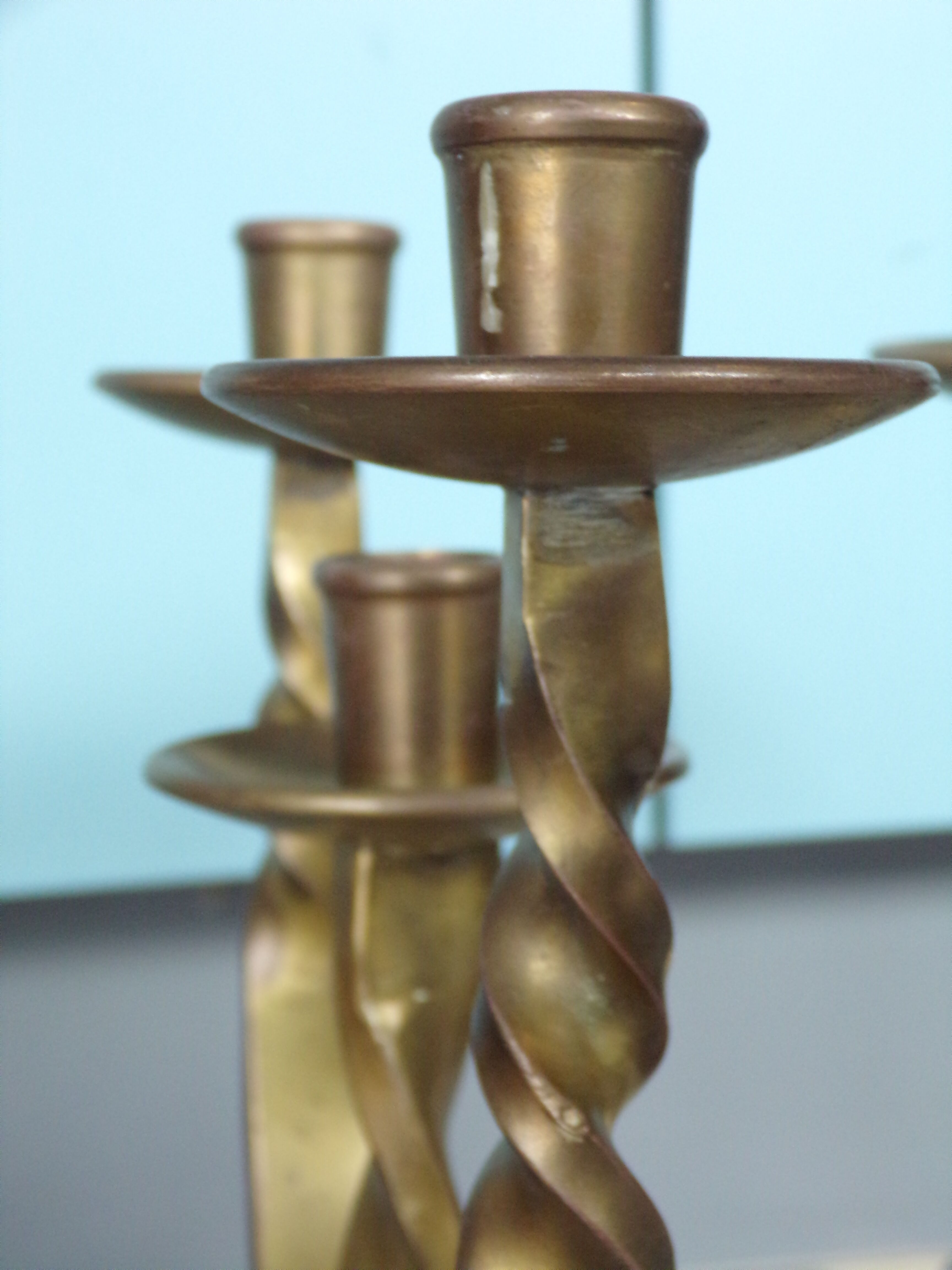 Pair of brutalist bronze candle holders