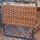 Folding magazine rack in metal and vintage woven wicker