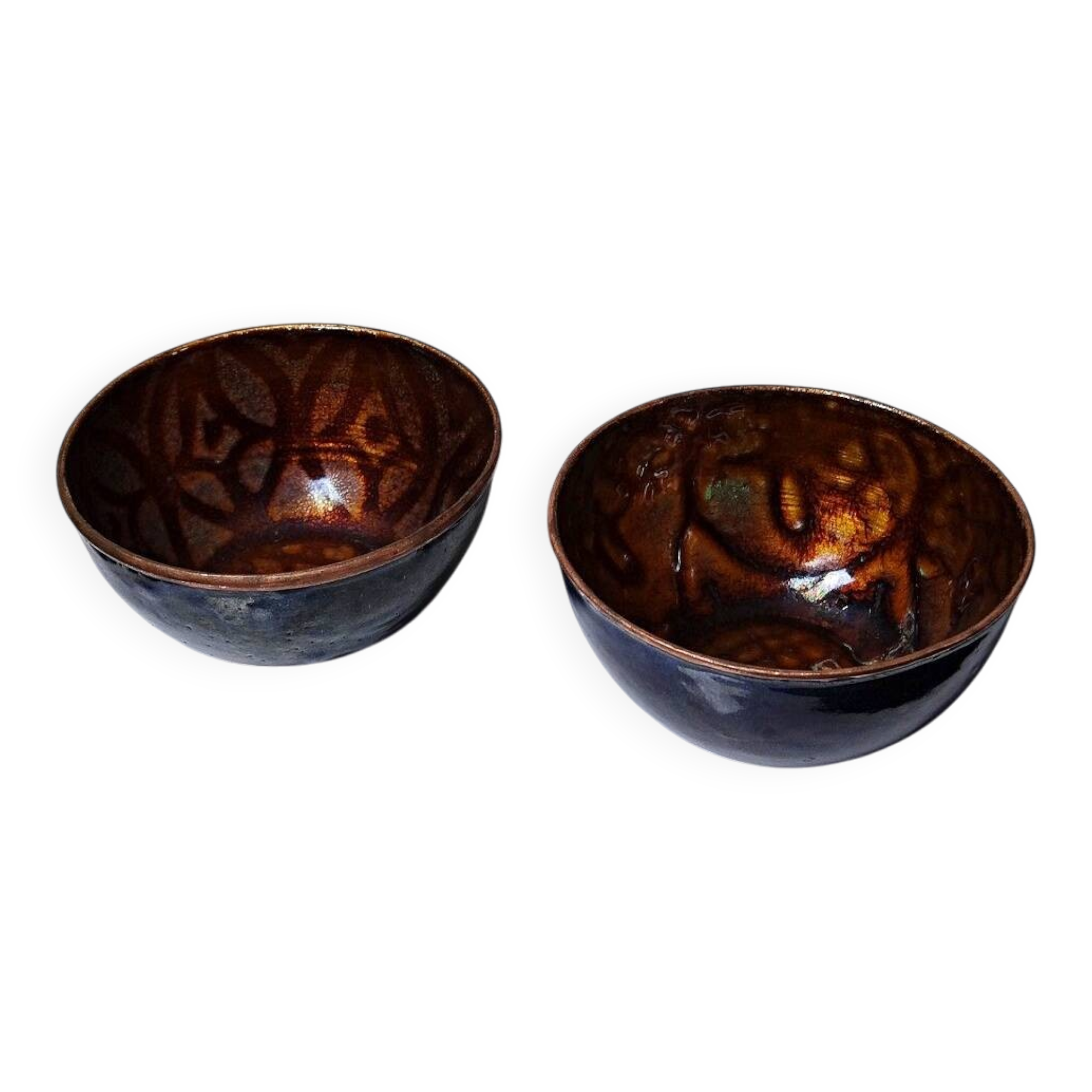 Pair of vintage hand-crafted blue and copper enamelled bowls.