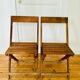 Two vintage wooden folding chairs, circa 1960