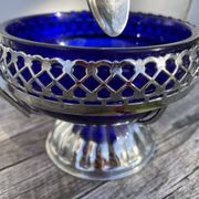Silver-plated metal and blue glass sugar and salt shaker