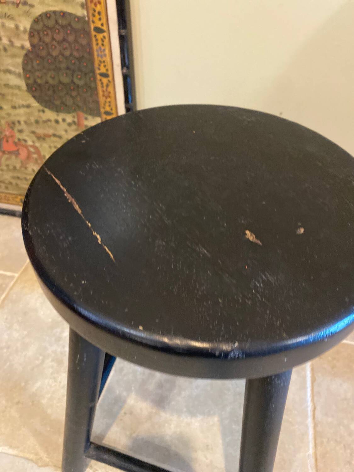 Black wooden stool