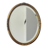 Antique oval mirror in wood and gilt stucco, Louis XV style